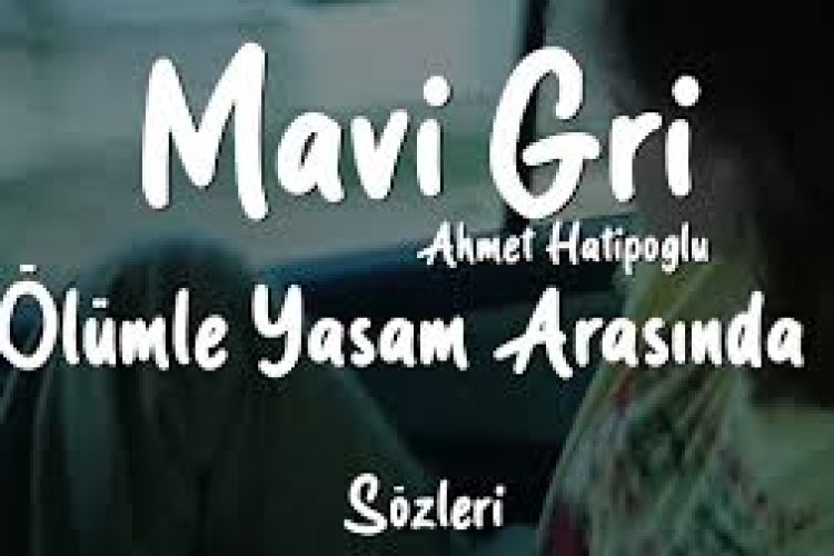Mavi Gri - Ahmet Hatipoğlu - Gülüşünde Bi’ Şeyler Saklı Şarkı Sözleri