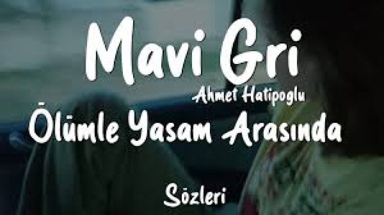 Mavi Gri - Ahmet Hatipoğlu - Gülüşünde Bi Şeyler Saklı Şarkı Sözleri